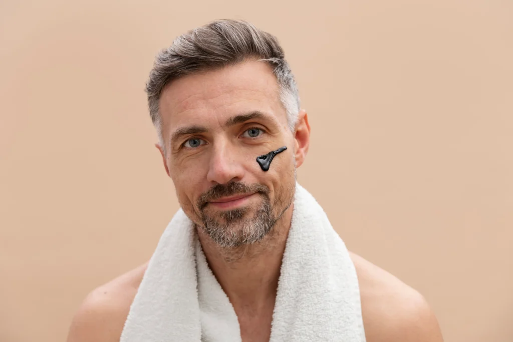 man using anti aging treatment